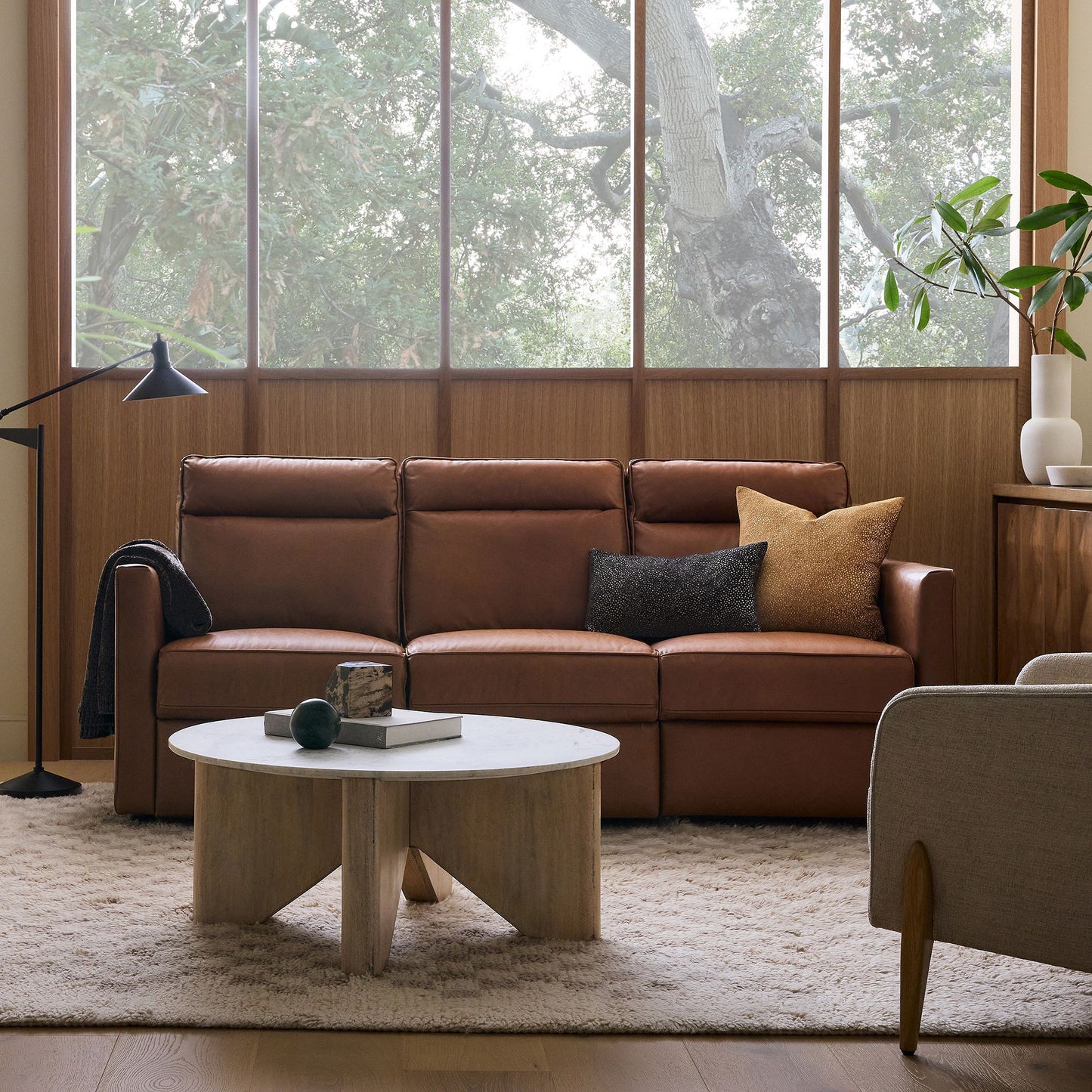 Chen 60" Reclining Leather Sofa